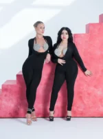 A jumpsuit with an open design and a shiny silver bustier