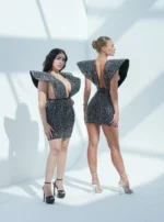 A short dress with raised shoulders